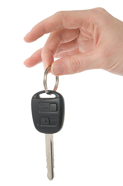 istock a human hand holding a car key 172730675