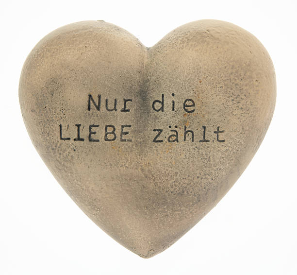 seul amour compte-pierre cœur inscription en allemand - eternity love stone heart shape photos et images de collection