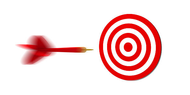 Concept photo of a red dart flying toward a target