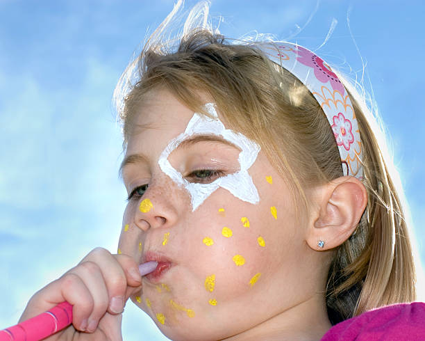 Face Paint and Balloons stock photo