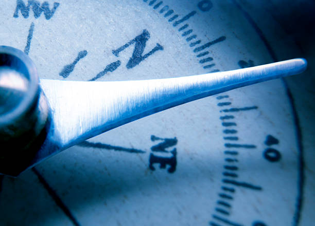 istock Close up of needle on directional compass 172734660
