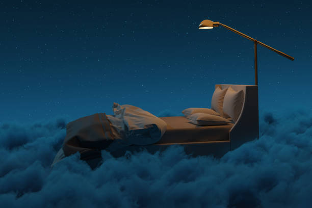 istock 3D rendering of cozy bed illuminated by lamp. The bed flying over fluffy clouds at night 1727346664