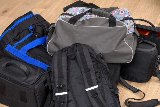 istock Packed travel bags lie on the floor 1727358655