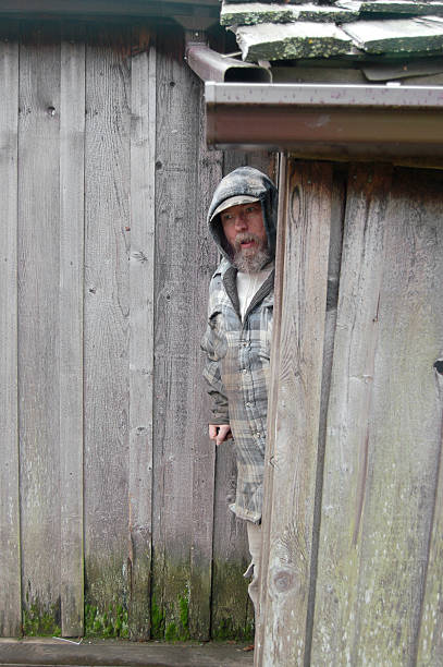 This poverty stricken man comes out of his hovel.PLEASE SEE MY OTHER HOMELESS PHOTOS