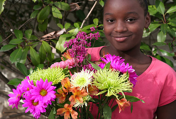 istock girl with flowers 172736067