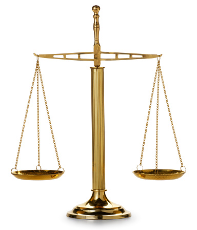 Golden justice scale isolated on white background. 3d render