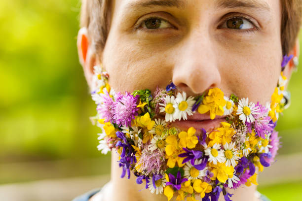 istock Floral-bearded man reflects pure eco-awareness 1727369557