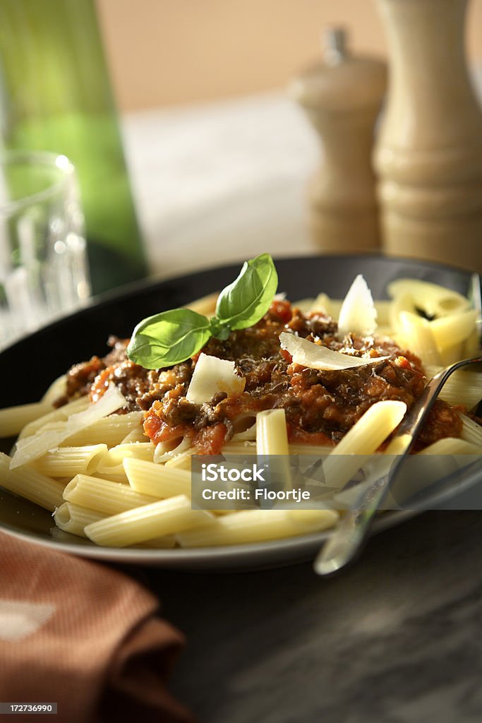 Italiano immagini: Penne al sugo - Foto stock royalty-free di Cibi e bevande