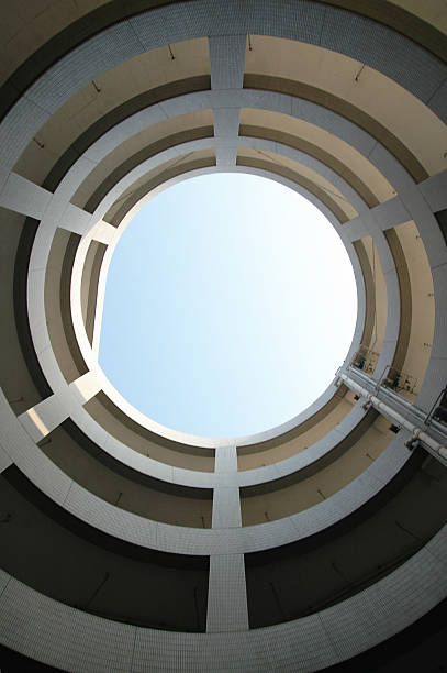 istock Circular Corridors and open roof in a building 172737460