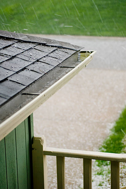 istock Hail Stones Hitting Roof During a Storm, vertical 172737833