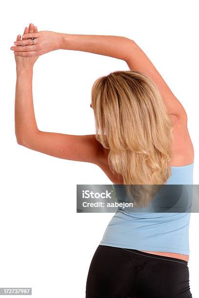 Stretching Obliques Stock Photo - Download Image Now - 20-24 Years, 20-29 Years, Activity