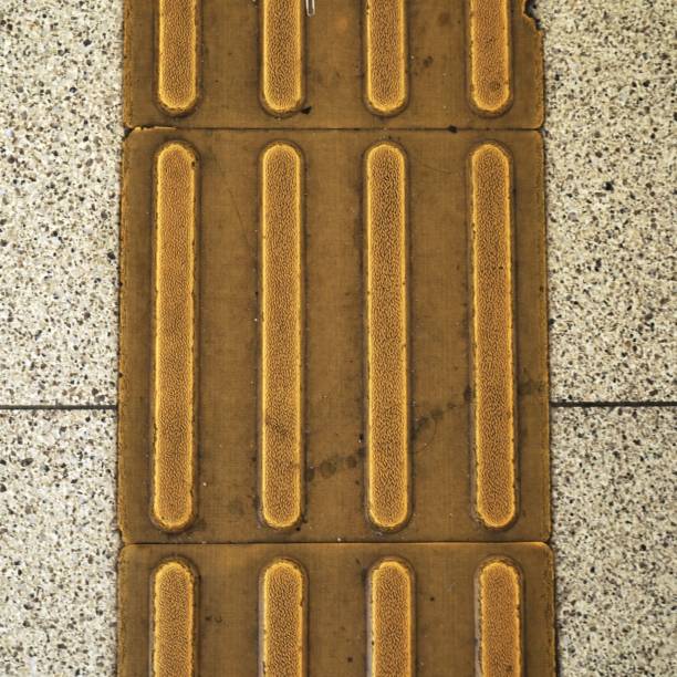 istock Braille Pavement Stripes Tactile Paving 1727382496