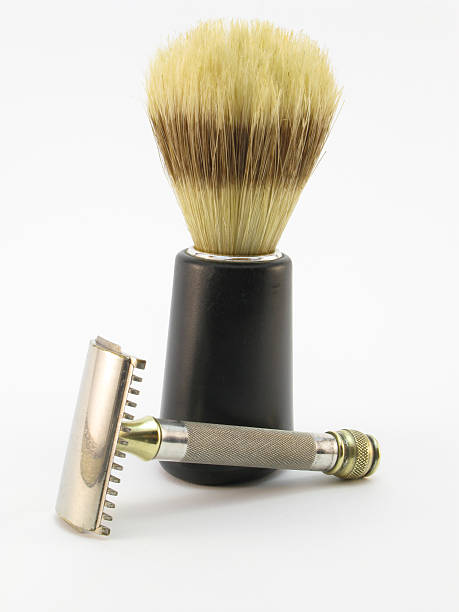 Retro shaving kit on white background.