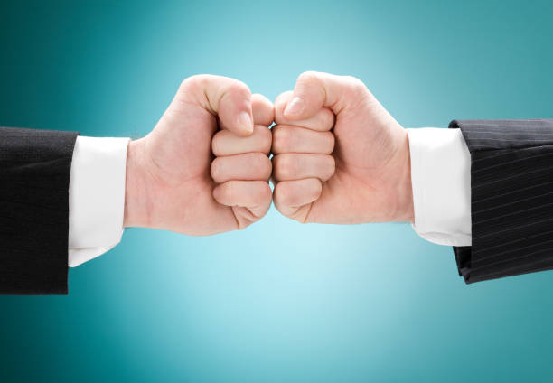 istock business competition concept with fist isolated 172738759