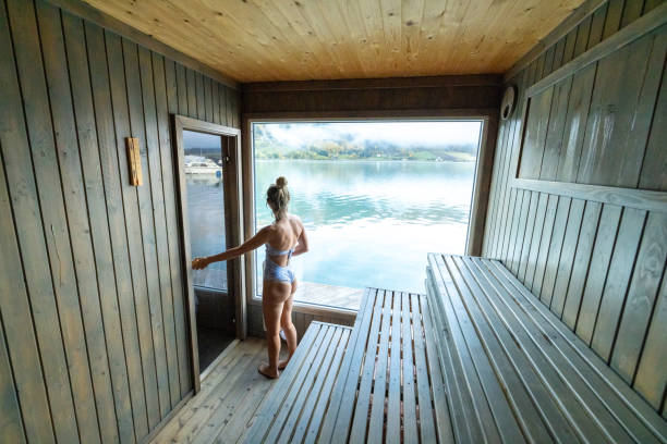 istock Young woman relaxing in floating sauna 1727390934