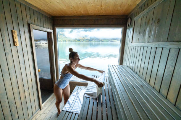 istock Young woman relaxing in floating sauna 1727391997