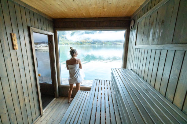 istock Young woman relaxing in floating sauna 1727392003