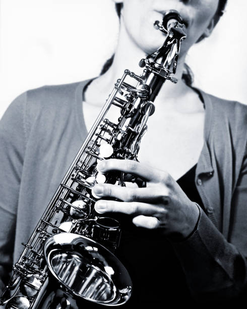 istock woman playinge the sax 172739228