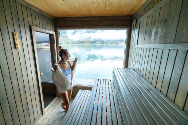 istock Young woman relaxing in floating sauna 1727392520