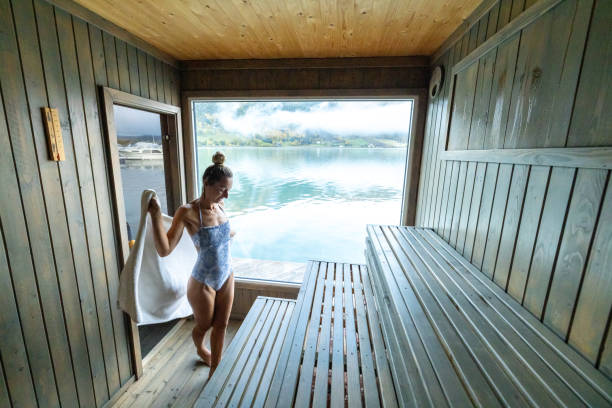 istock Young woman relaxing in floating sauna 1727392523