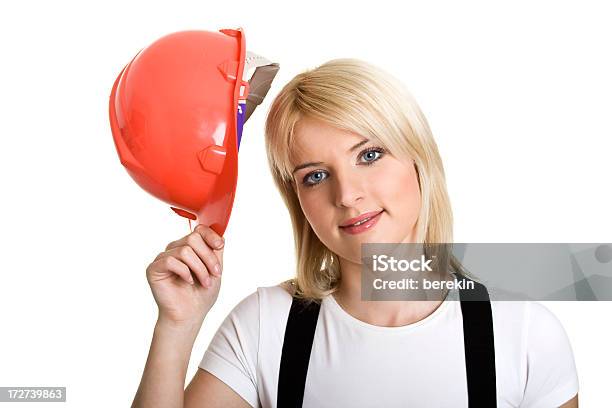 Foto de Mulher Trabalhador Com Capacete Vermelho e mais fotos de stock de Sexo Feminino - Sexo Feminino, Trabalhador de Construção, Adulto