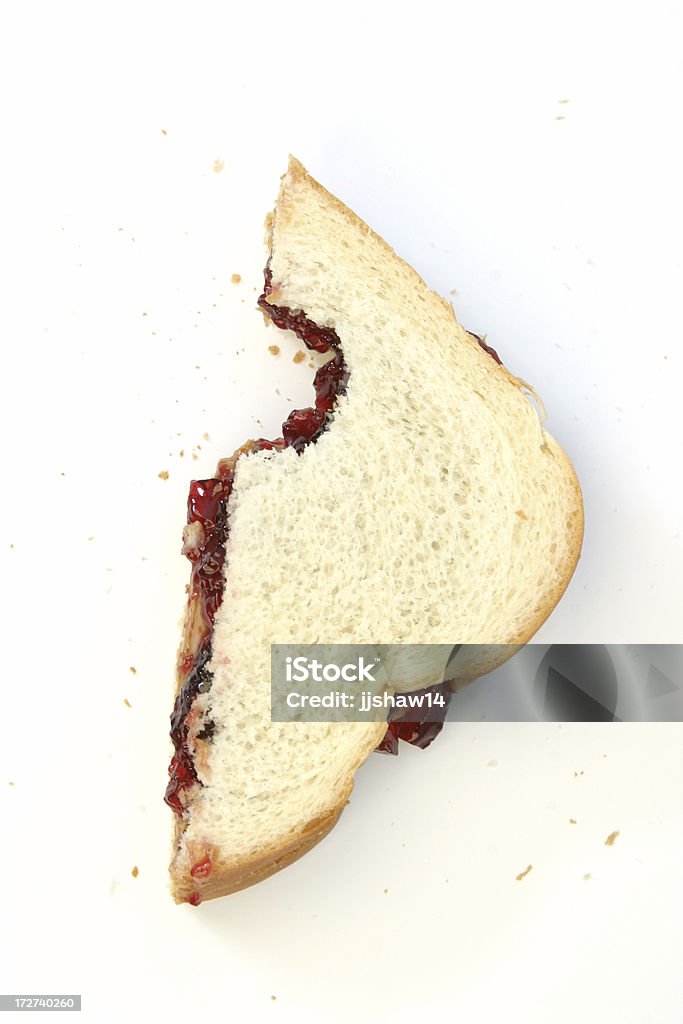 Peanut Butter & Jelly Sandwich Peanut butter and jelly sandwich with a bite taken out of it. Peanut Butter And Jelly Sandwich Stock Photo