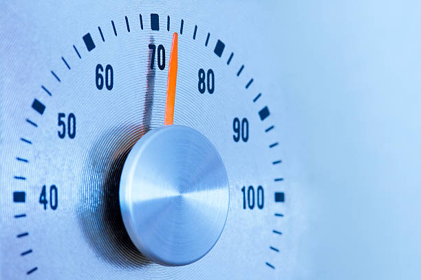 Thermostat Thermometer - 70 Degrees stock photo