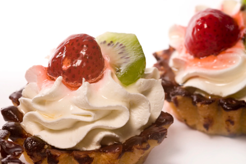 Cupcake desserts with strawberry and kiwi