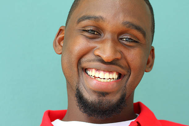 istock portrait of young laughing man 172741604