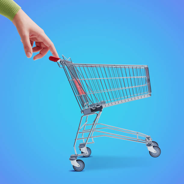 istock Customer pushing a small shopping cart 1727417204