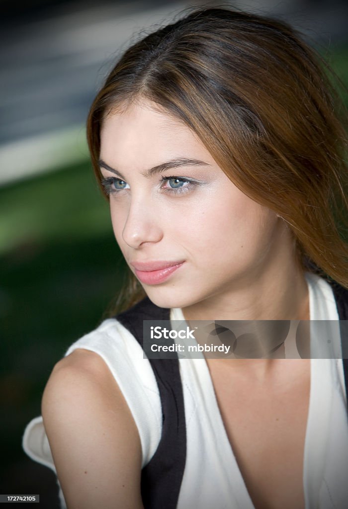 Beautiful teenage girl Beautiful teenage girl. Shallow DOF selective focus on her eyes.  16-17 Years Stock Photo