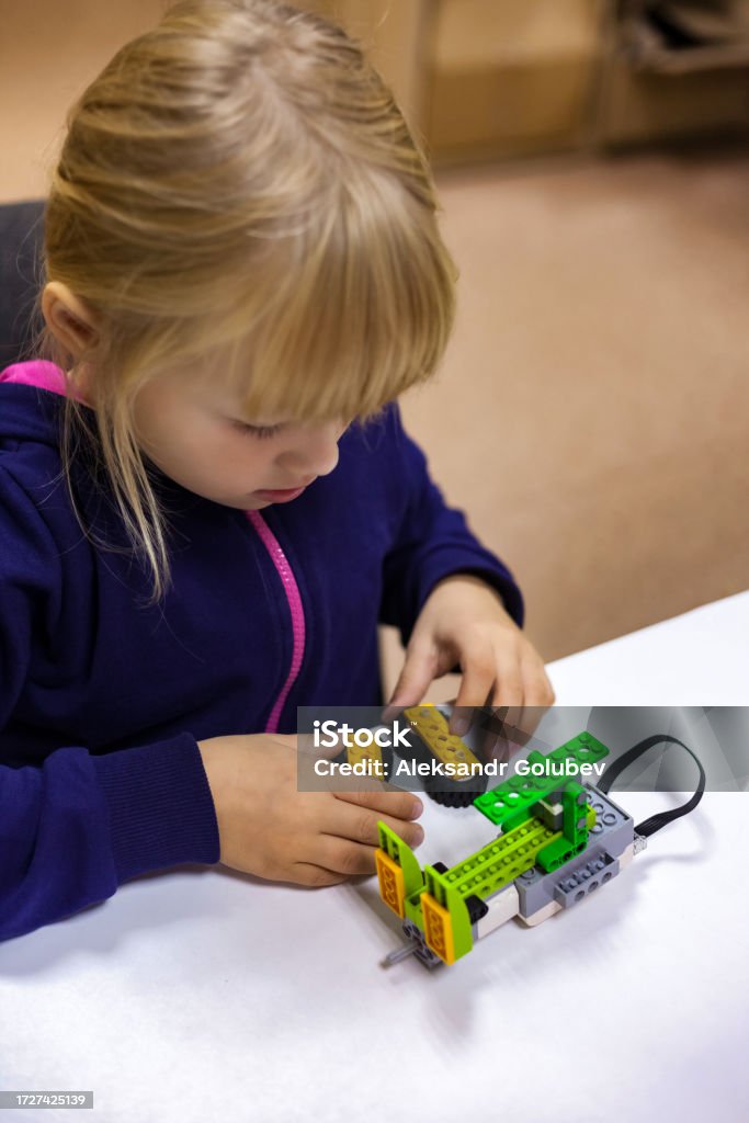 Child Inventing Learning Robotics Basics Concept Kid Girl 5 Year Old Construct Robotic ...