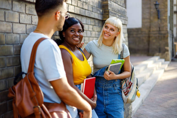 istock University mates chatting and relaxing 1727426259