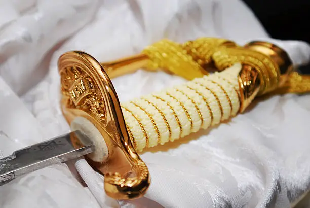 A navy ceremonial sword.