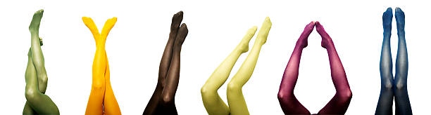 Legs wearing different colored tights Legs in colored tights at various positions. nimbly stock pictures, royalty-free photos & images