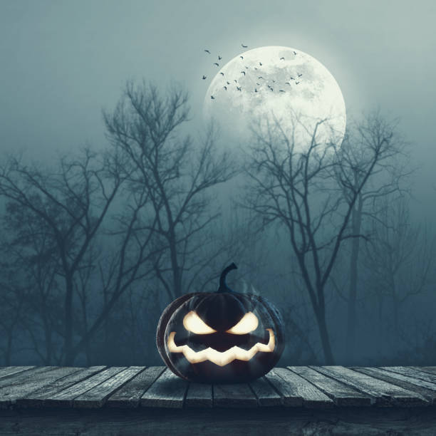 istock Scary Halloween pumpkin on a wooden deck 1727436589