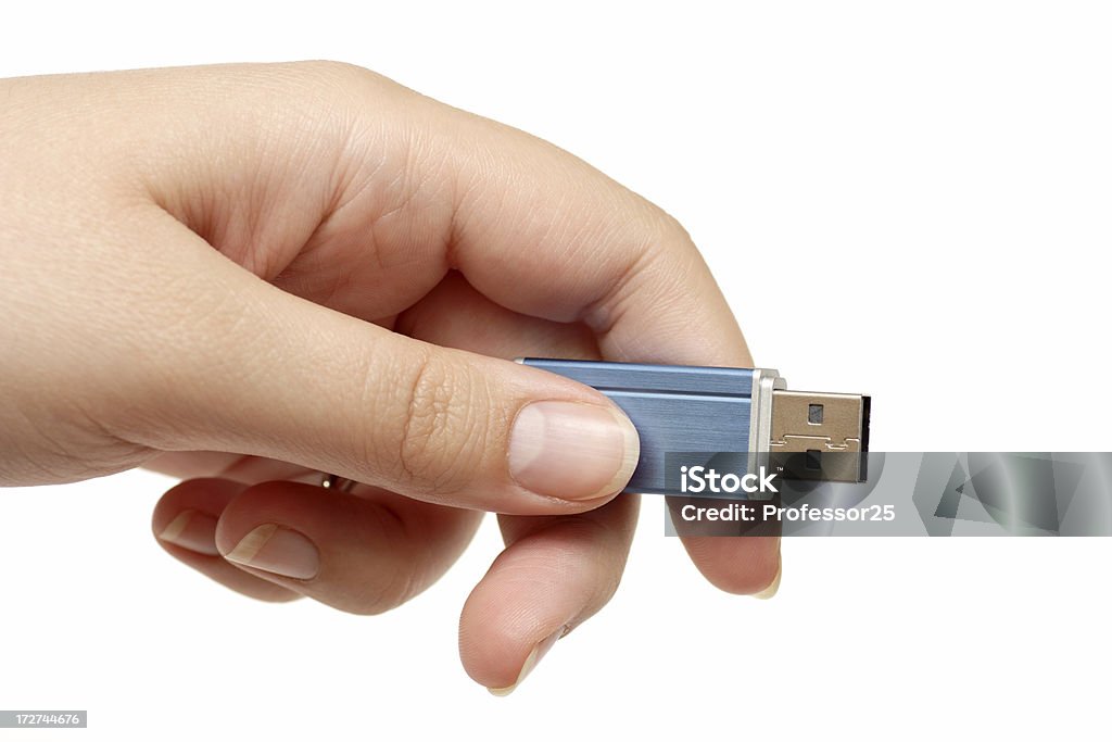 Unidad Flash USB en mano - Foto de stock de Llavero USB de memoria libre de derechos