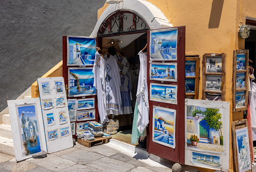 June 7, 2018 - Positano, Italy. The narrow red bricked shopping district streets in Positano, lined with giftshops and merchandise.