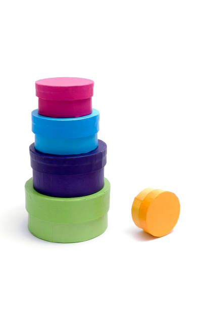 istock A set of multicolored round gift boxes stacked up. 172745185