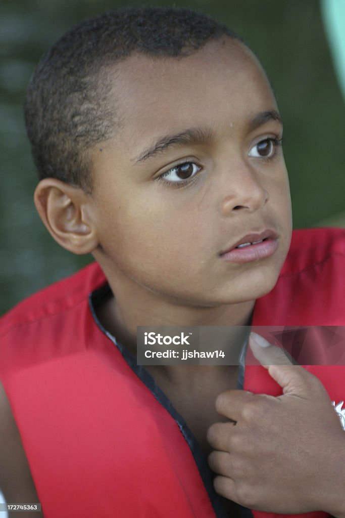 Boy en Lifejacket - Foto de stock de Africano-americano libre de derechos