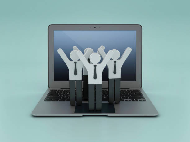 3D figure sits on the chair using a laptop computer.
