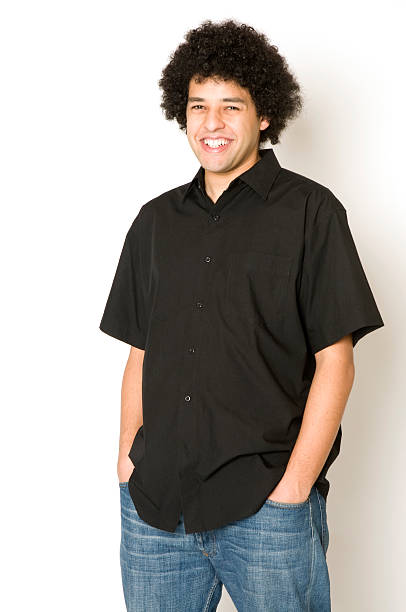 istock Young man with Afro posing with a smile 172746354