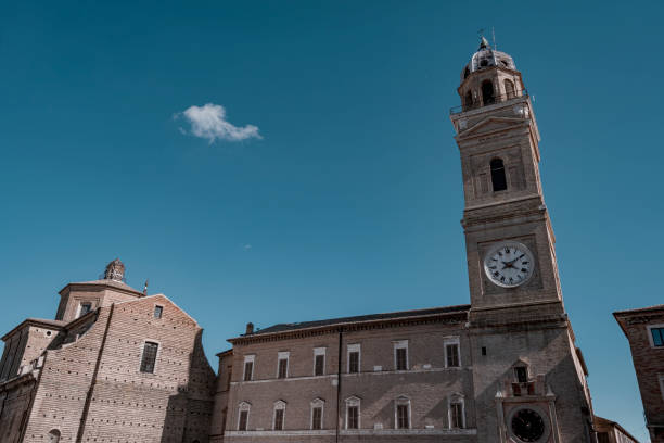 View of the historic downtown of Macerata city One of the symbols of Macerata is the high Civic Tower with its astronomical clock, the pride of the city. This, in addition to the time, measures the phases of the moon and the positions of the planets macerata italy stock pictures, royalty-free photos & images