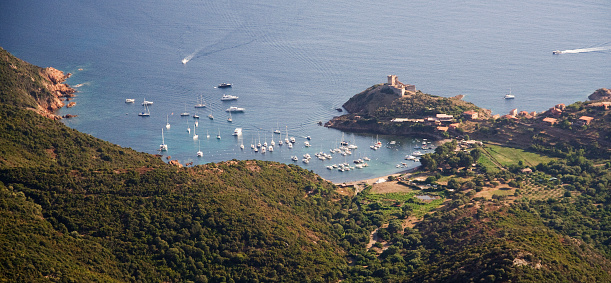 Small harbor at the coastline of Corsica.