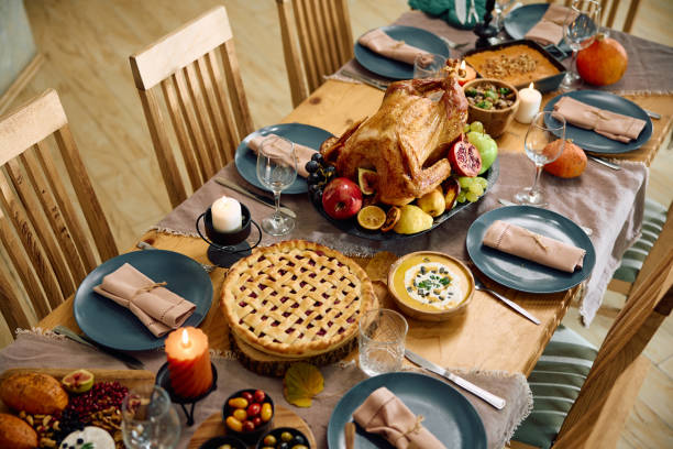istock High angle view of dining table on Thanksgiving. 1727470686