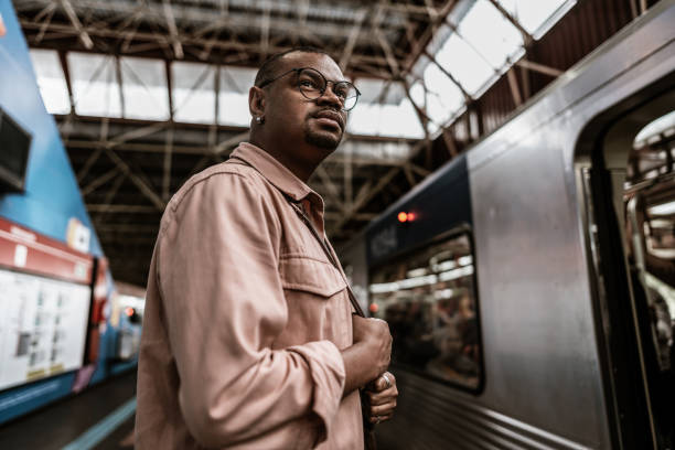 istock Mid adult businessman at subway platform 1727471236