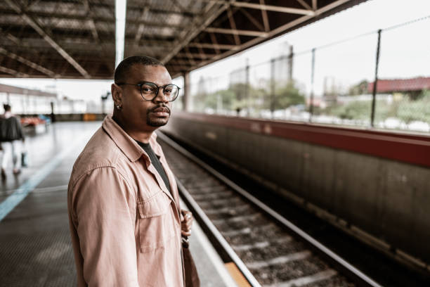 istock Mid adult businessman at subway platform 1727471241