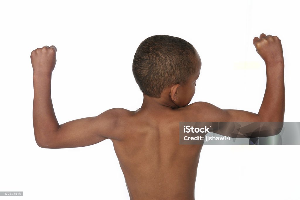 少年、筋肉 - 力こぶを作るのロイヤリティフリーストックフォト