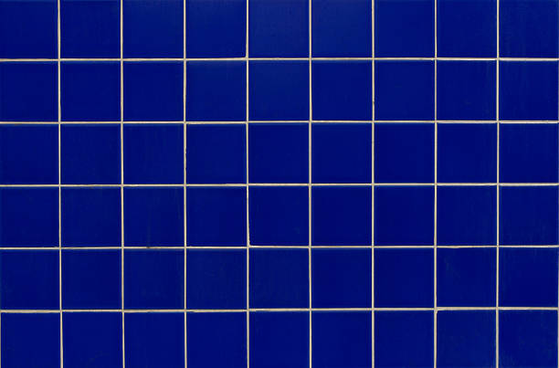 piastrelle blu - tiled floor dirty blue wall foto e immagini stock