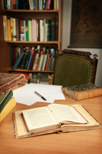 writer's workspace with books